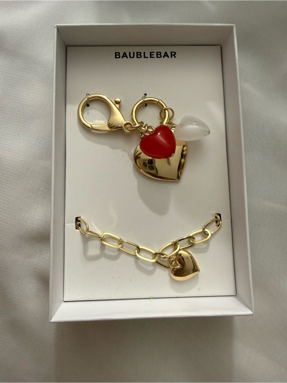 BaubleBar gold-tone heart bag charm and bracelet